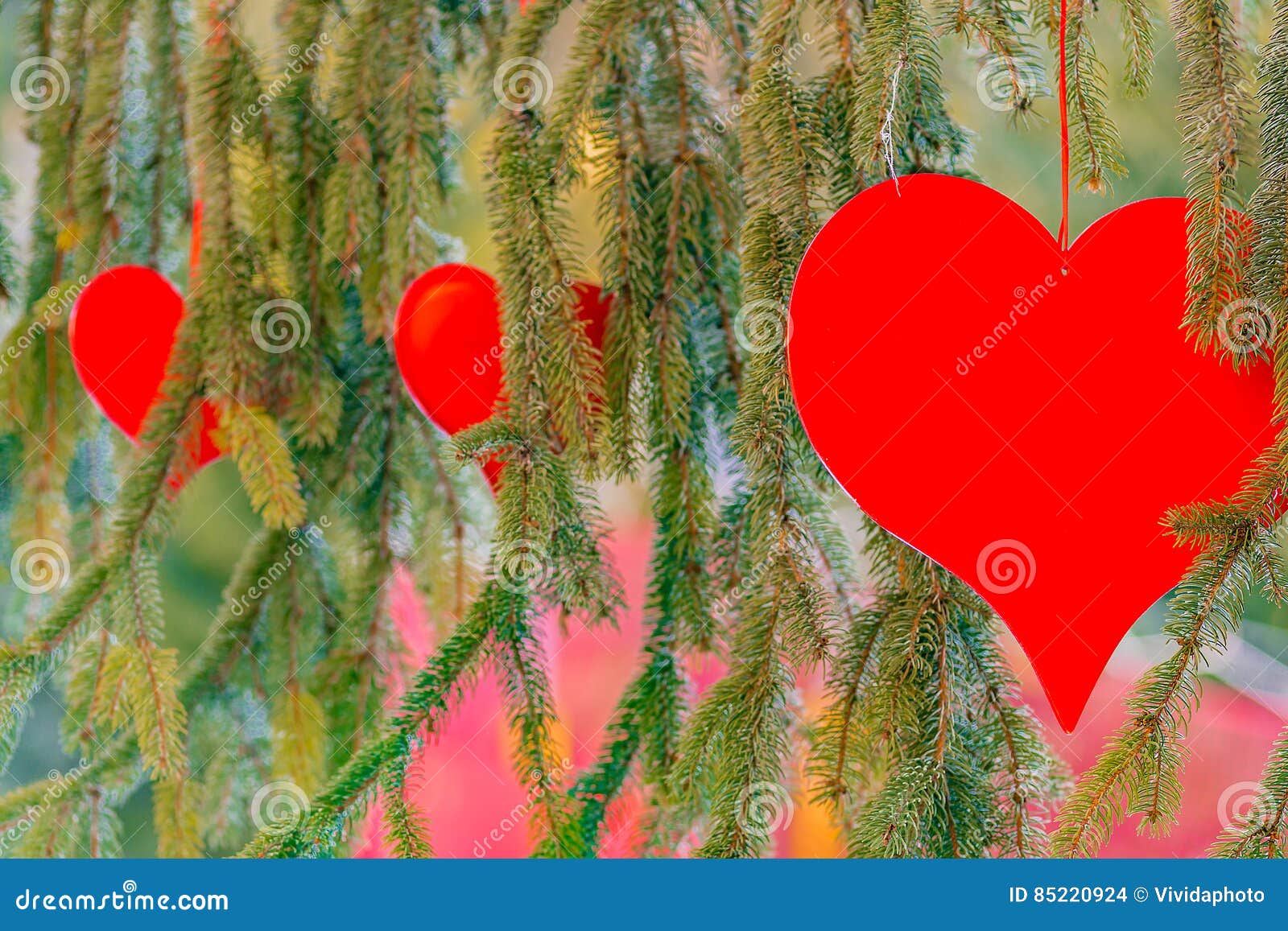 Three red hearts stock photo. Image of shape, three, garland - 85220924