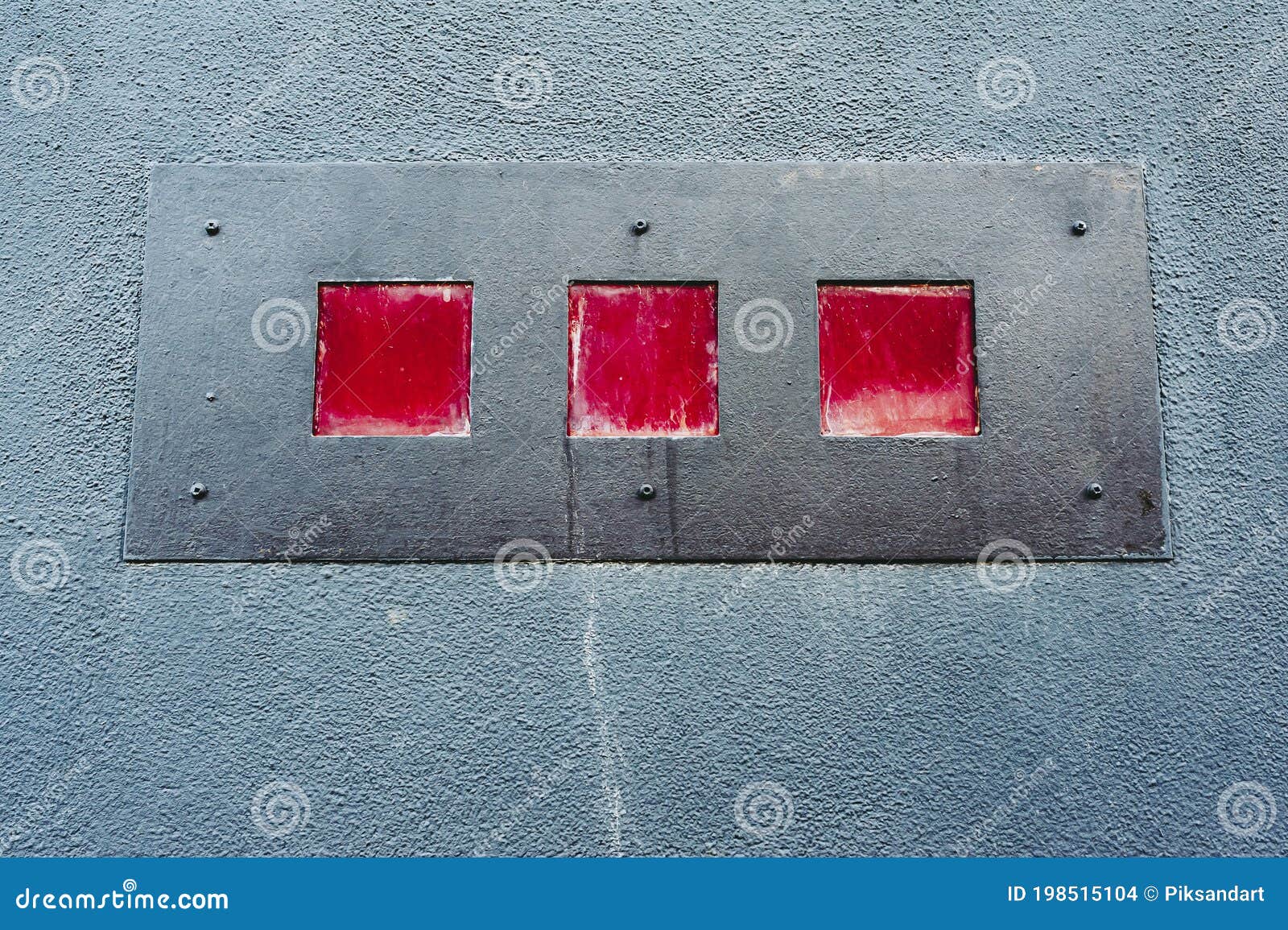 Three Red Squares on a Metallic Plate Design Wall Stock Photo Image