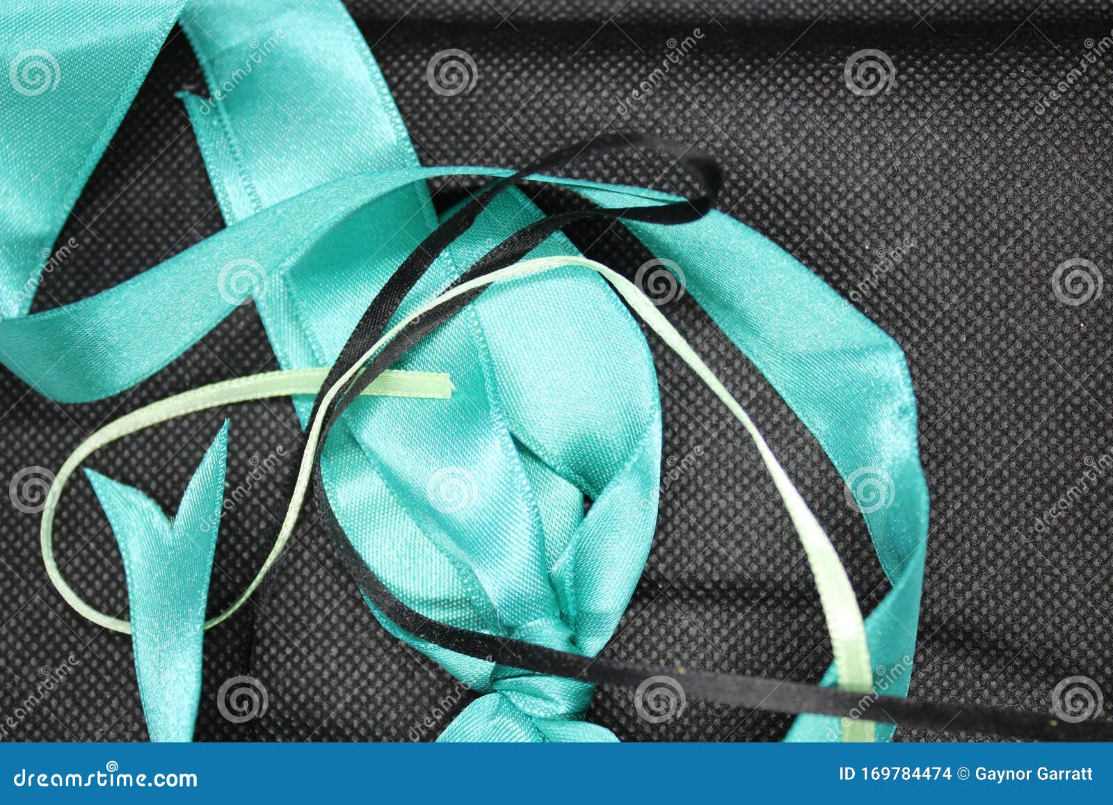 Three Ribbons on a Black Cloth Stock Photo - Image of ribbon, thin:  169784474