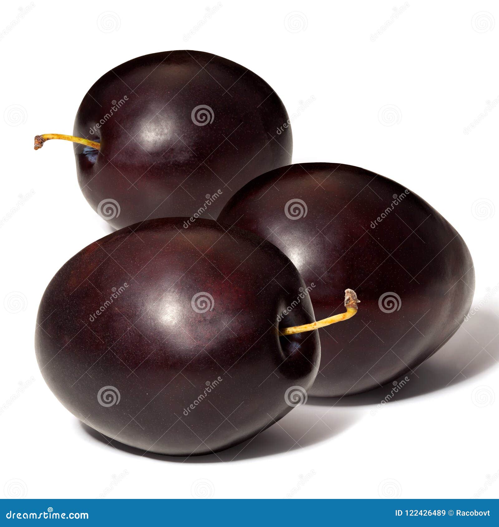 Three ripe black plums stock image. Image of nourishment 122426489