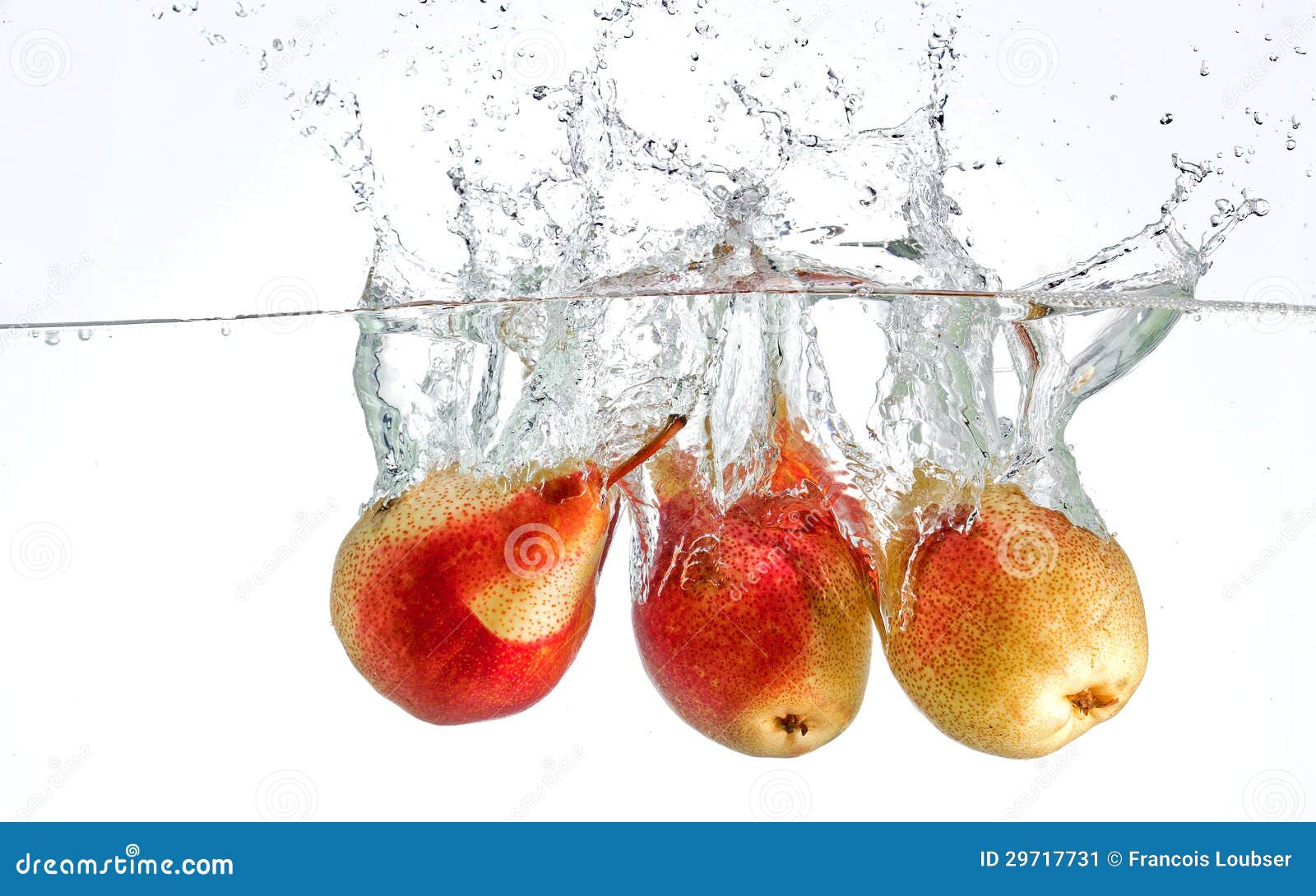 Pears splashing in water stock image. Image of white 29717731