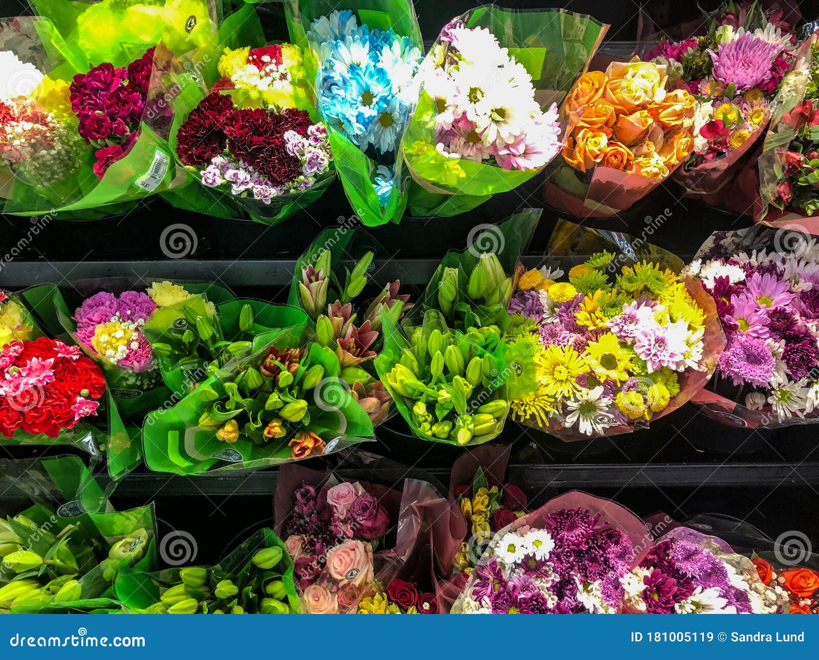 Colorful Bunches of Flowers for Sale Stock Image Image of three