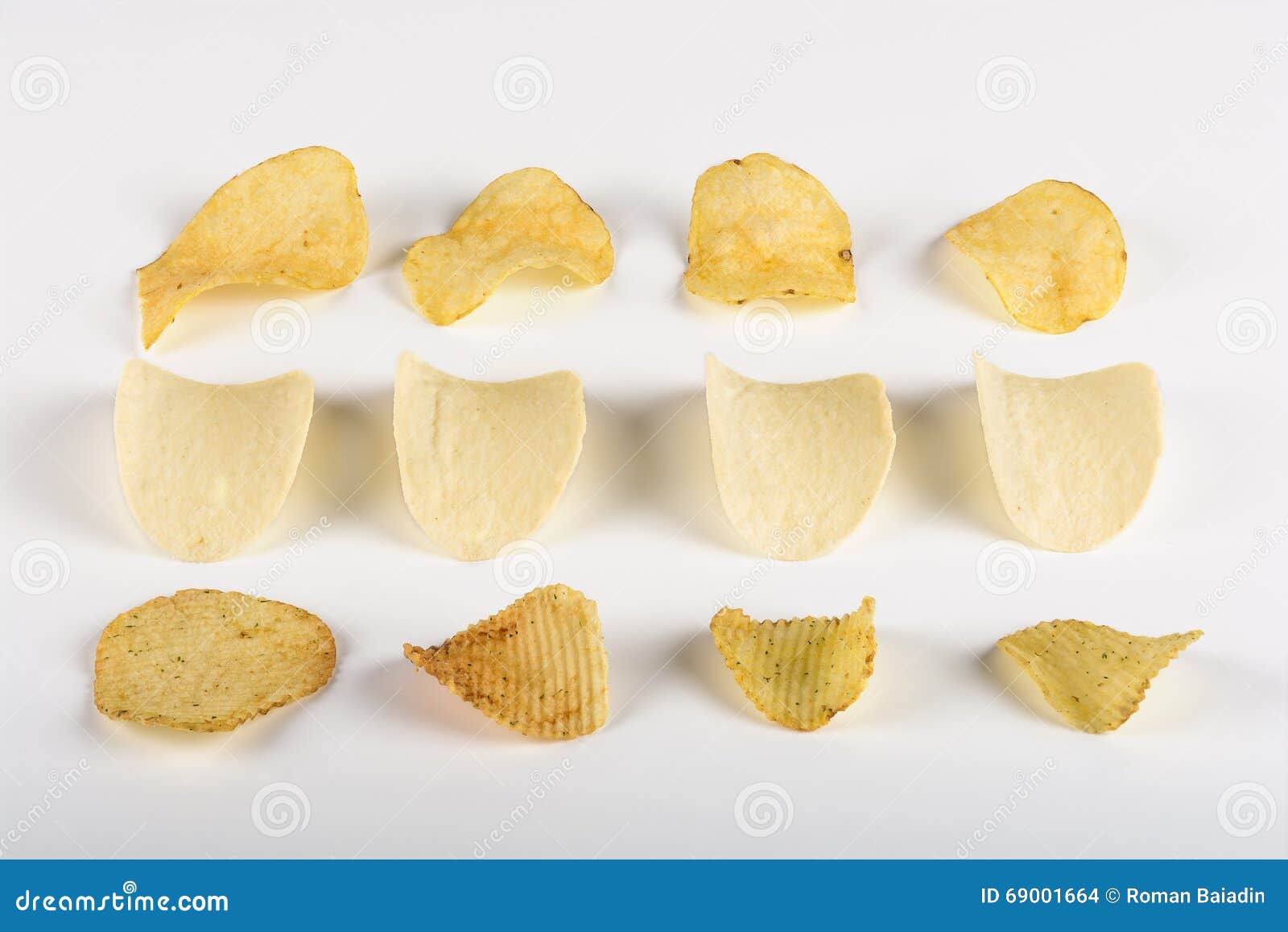 Three rows of potato chips stock photo. Image of salt 69001664
