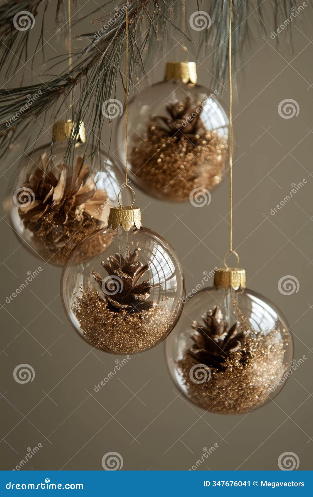 three shimmering glass ornaments rest on a pine-scented tree, adorned with delicate pine cones and glistening sand