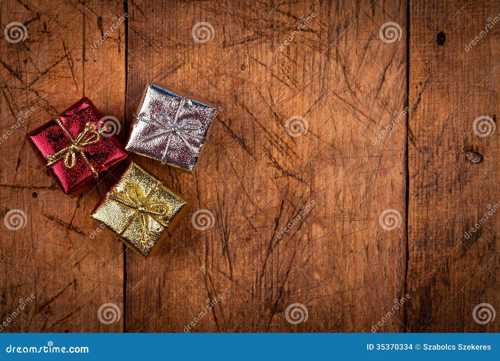 Three Small Gift Box On Vintage Wooden Table Stock Photo 