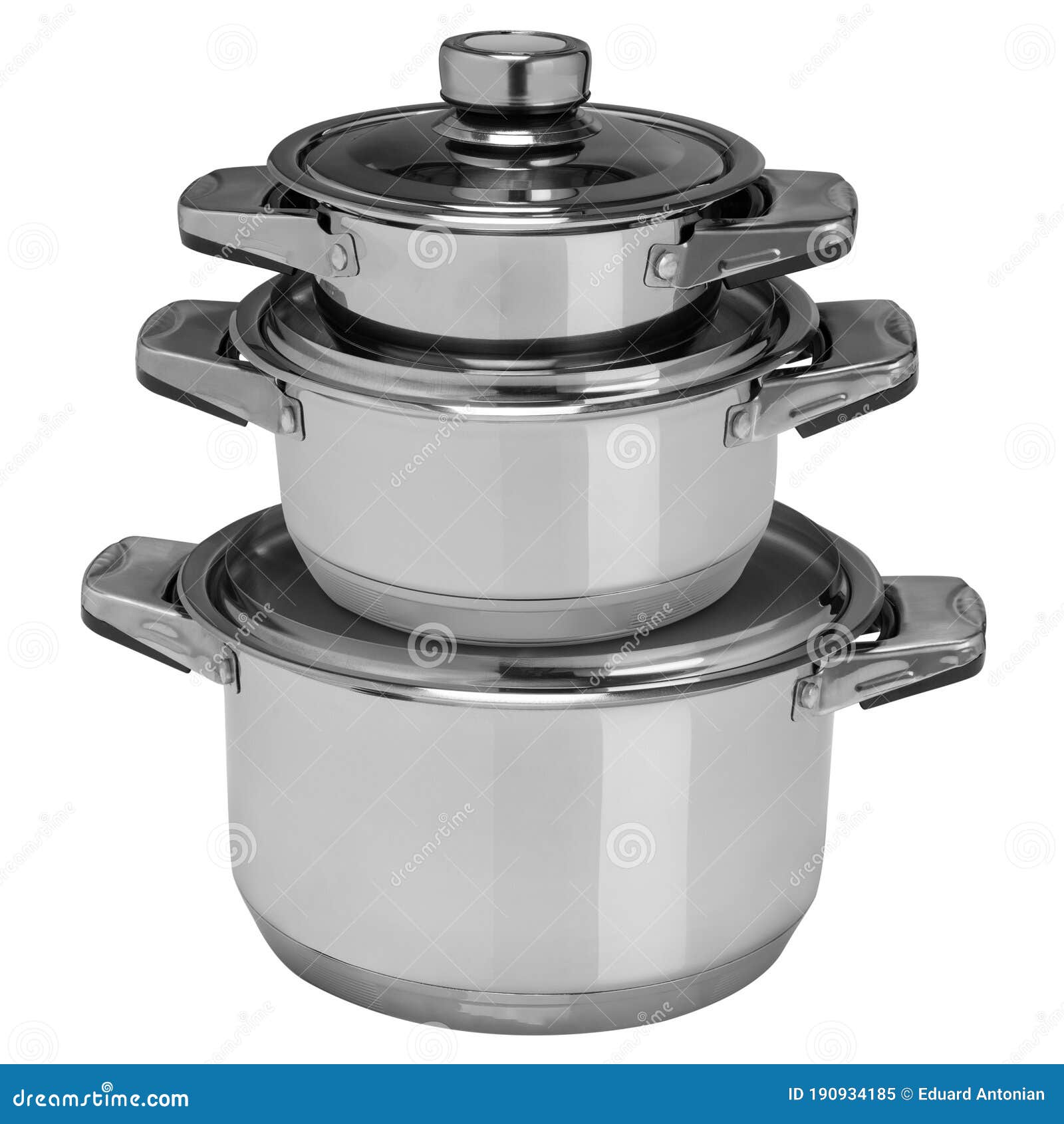 Three Stainless Steel Pans Stand in a Stack, One on the Other, a Set of Dishes, on a White