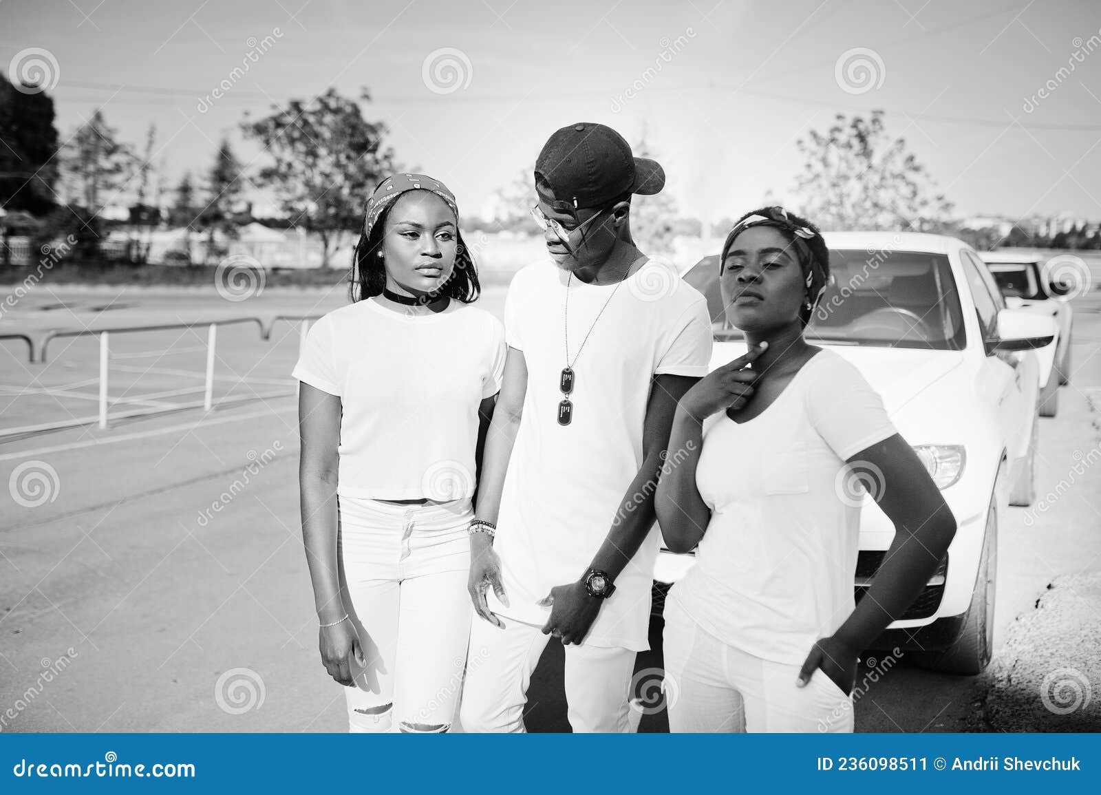 Three stylish african american friends, wear on white clothes