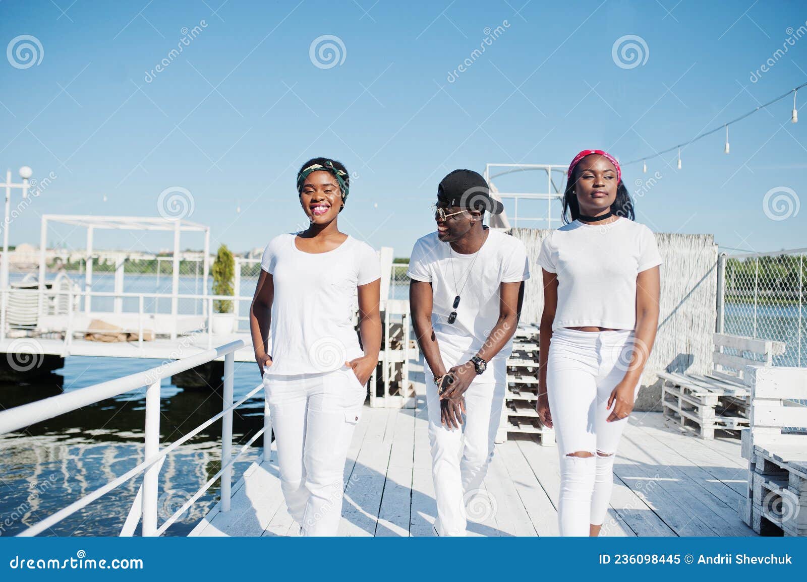 Three stylish african american friends, wear on white clothes