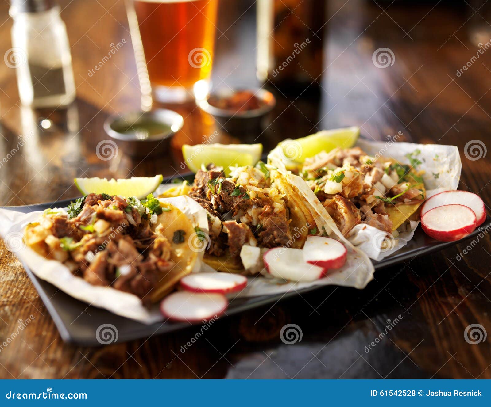 three tacos with beer