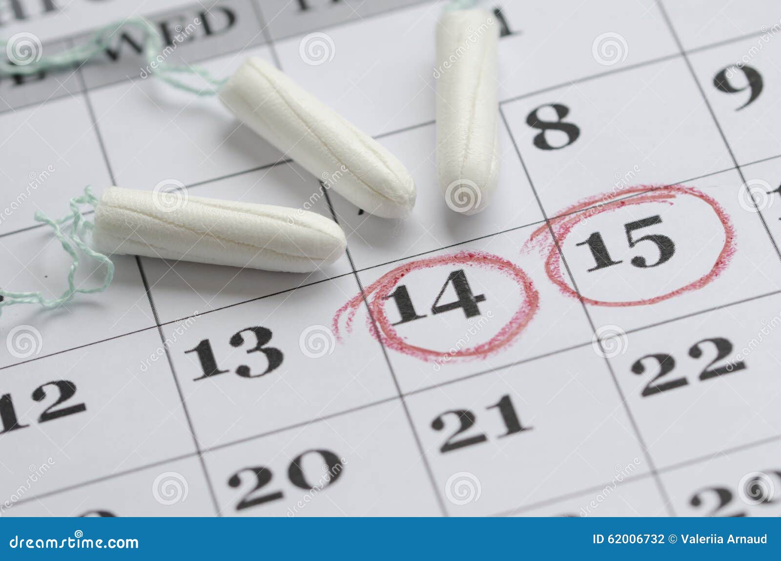three tampons on the menstruation calendar
