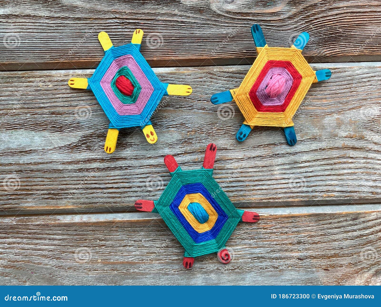 Three Turtles Children`s Creative, Craft from Yarn and Wooden Sticks