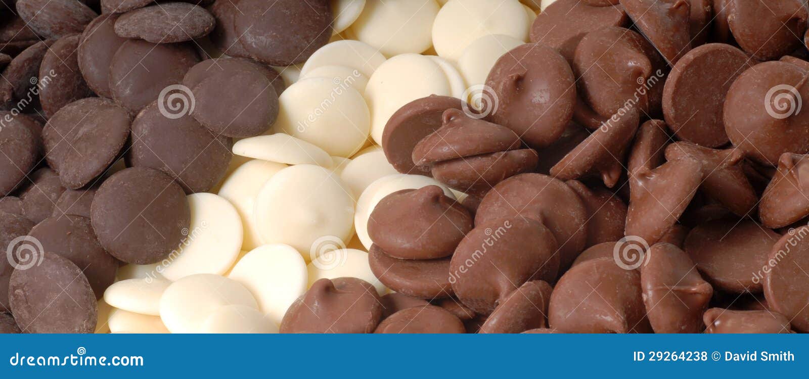 Three Types of Chocolate Chips, Dark, White and Semisweet Stock Photo
