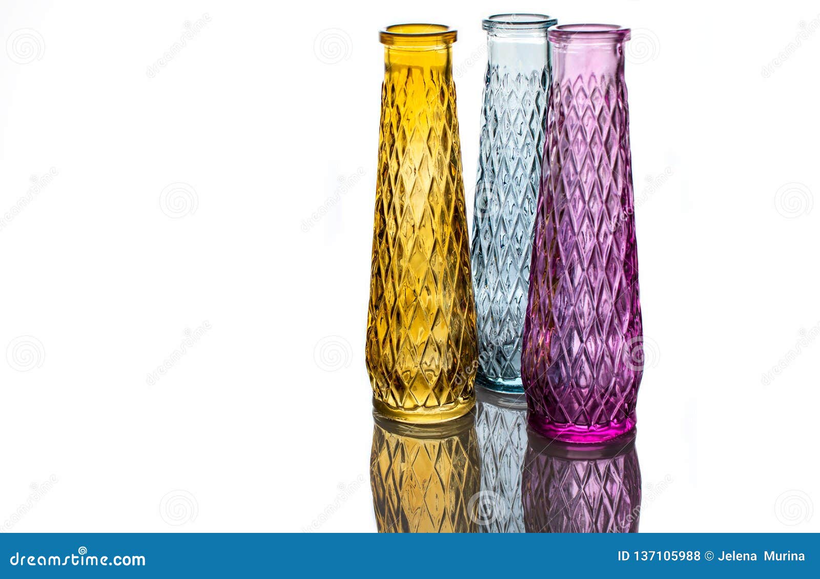 Three Vases of Colored Glass with a Pattern Stock Photo Image of