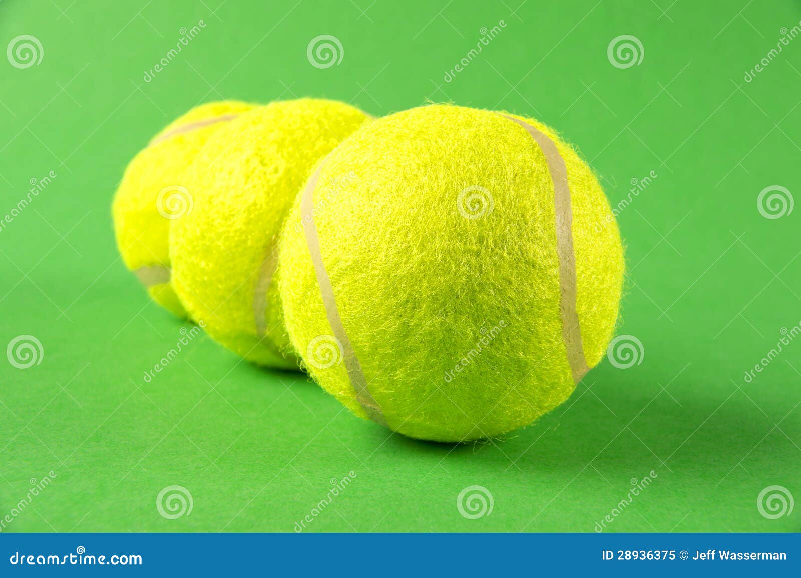 Three Yellow Tennis Balls on Green Background Stock Image Image of
