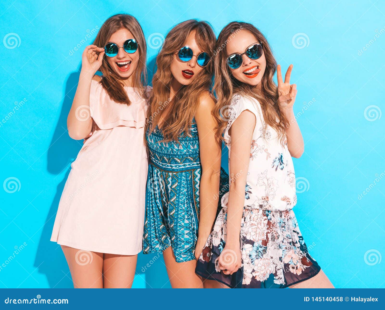 Three Young Beautiful Hipster Girls in Trendy Clothes in Studio Stock ...