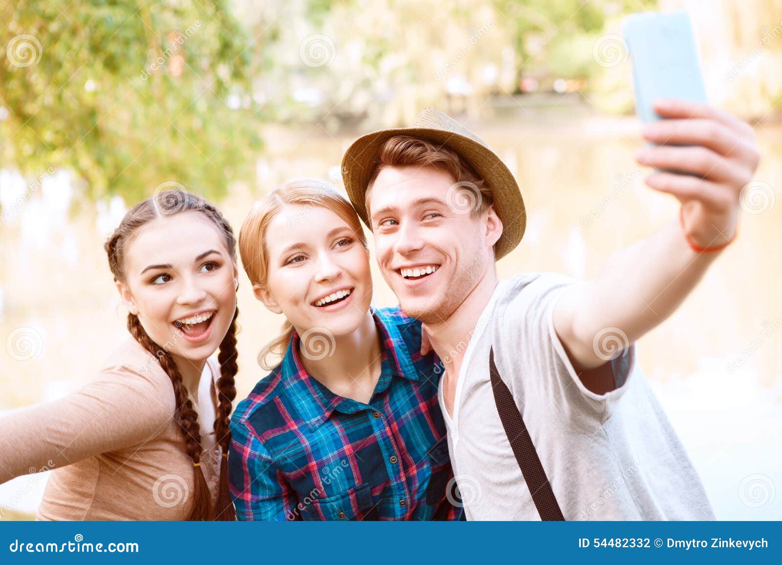 Three Young People Doing Selfie in Park Stock Photo Image of lake