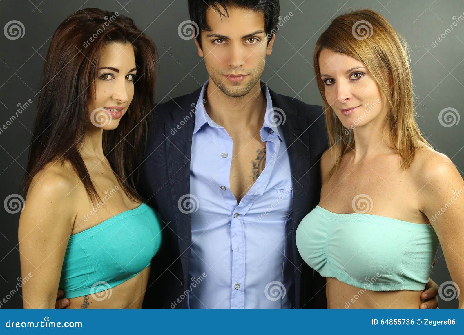 Three young swingers stock photo