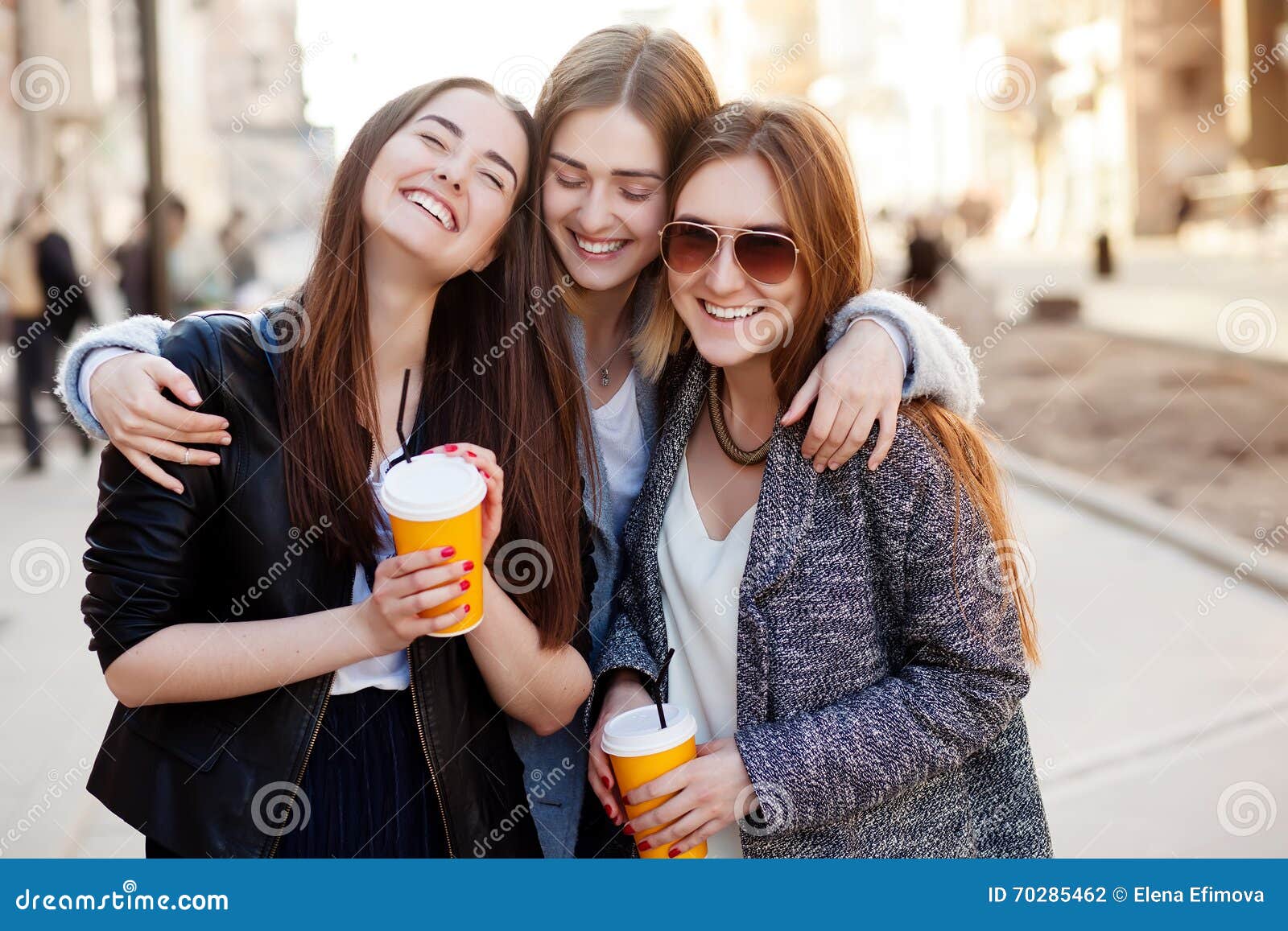 Three Young Women, Best Friends Smiling at the Camera Stock Photo ...