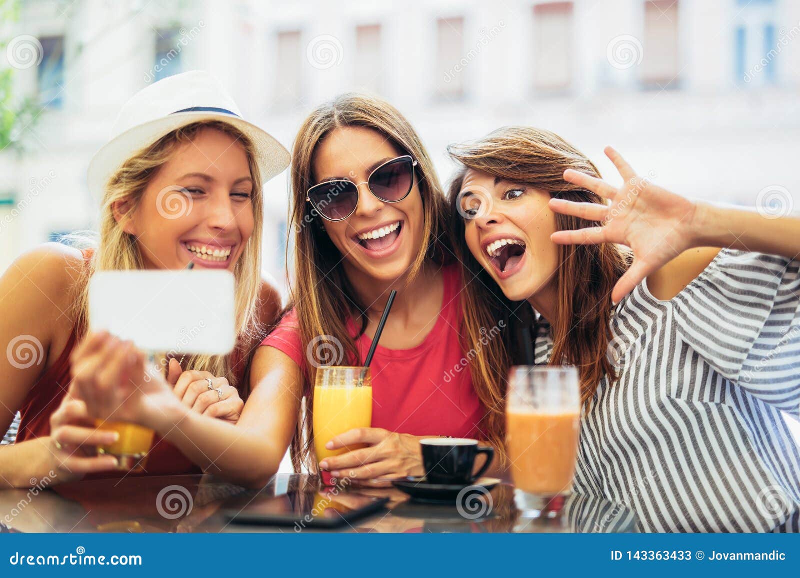 Three Young Women in a Cafe after a Shopping Make Selfie Photo Stock ...