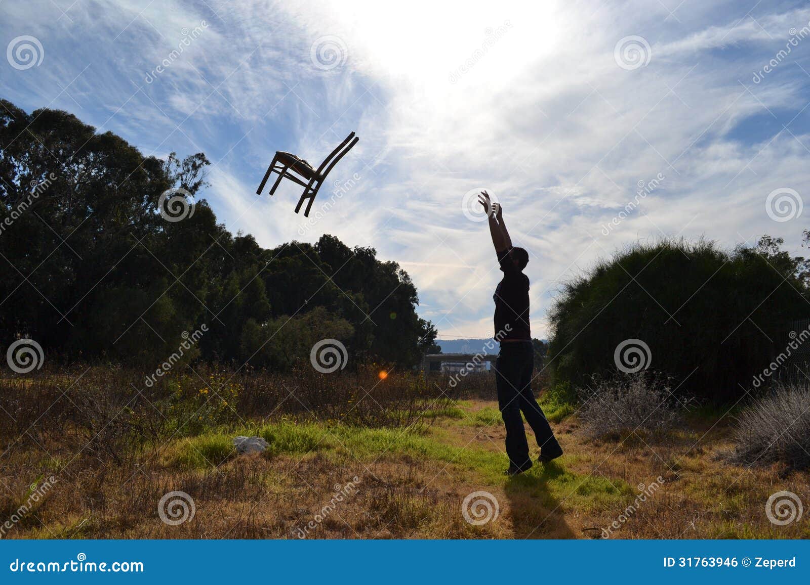 Throwing a Chair in the Air Stock Photo Image of forniture