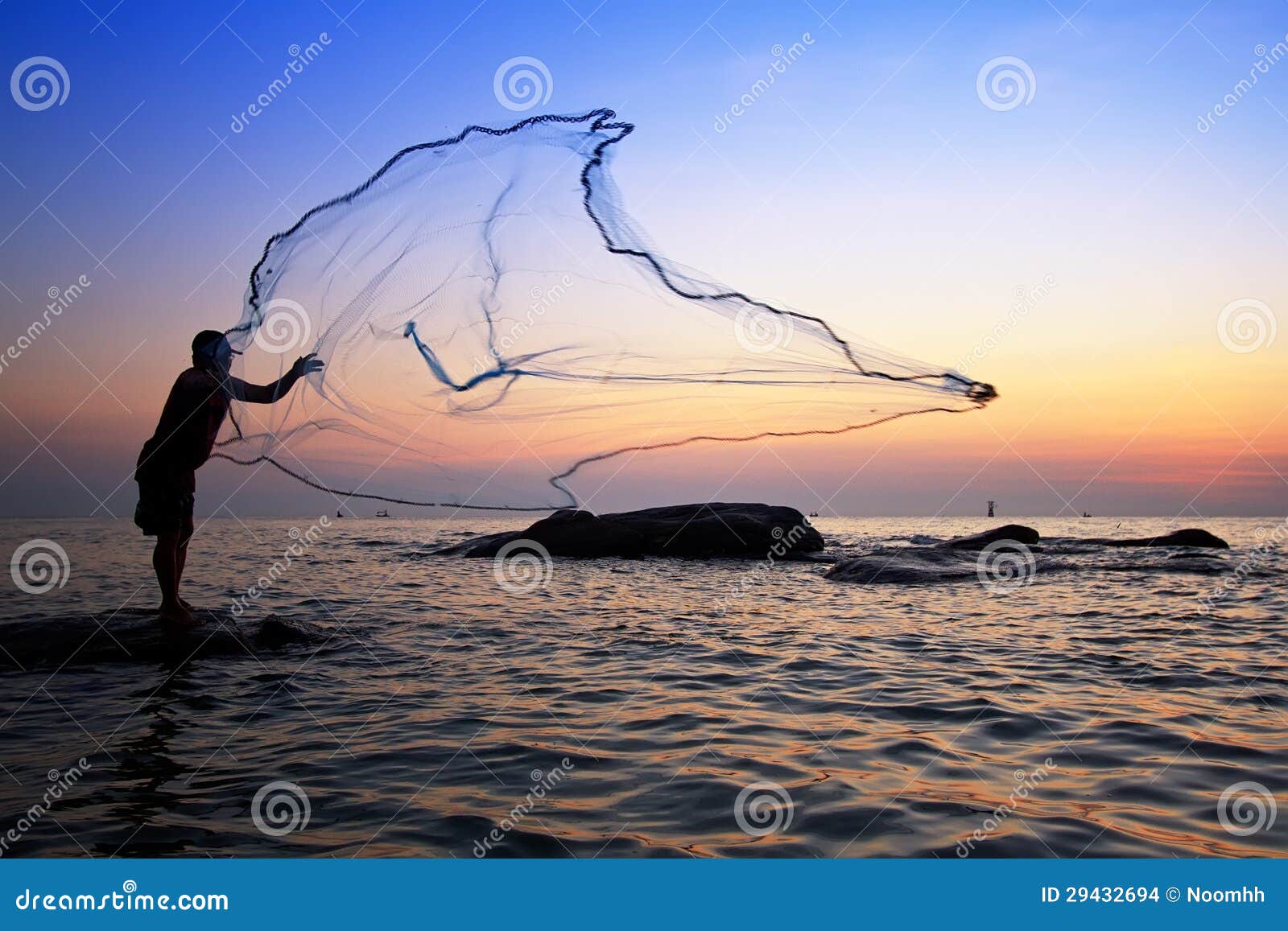 Throwing fishing net stock photo. Image of lake, orange - 29432694