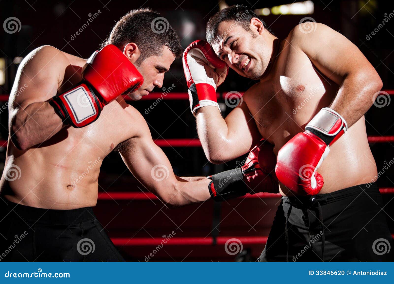 Throwing a Hook on a Boxing Fight Stock Photo - Image of fight