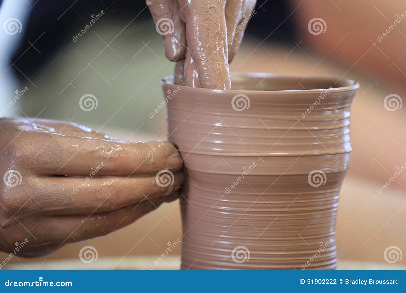 throwing/making pottery
