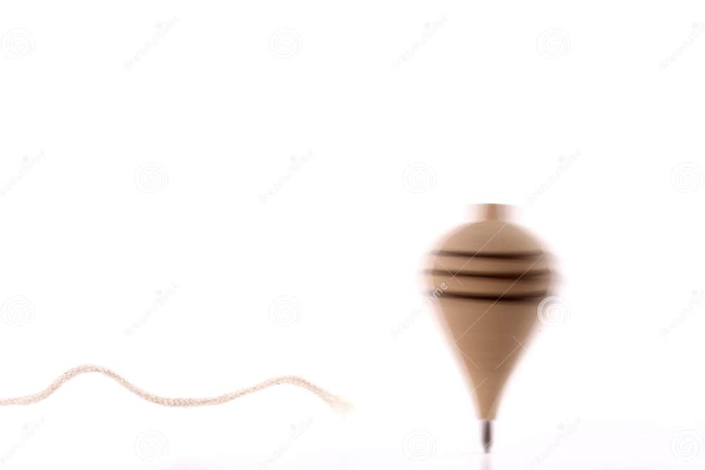 Throwing a spinning top stock photo. Image of white, spin 33478568