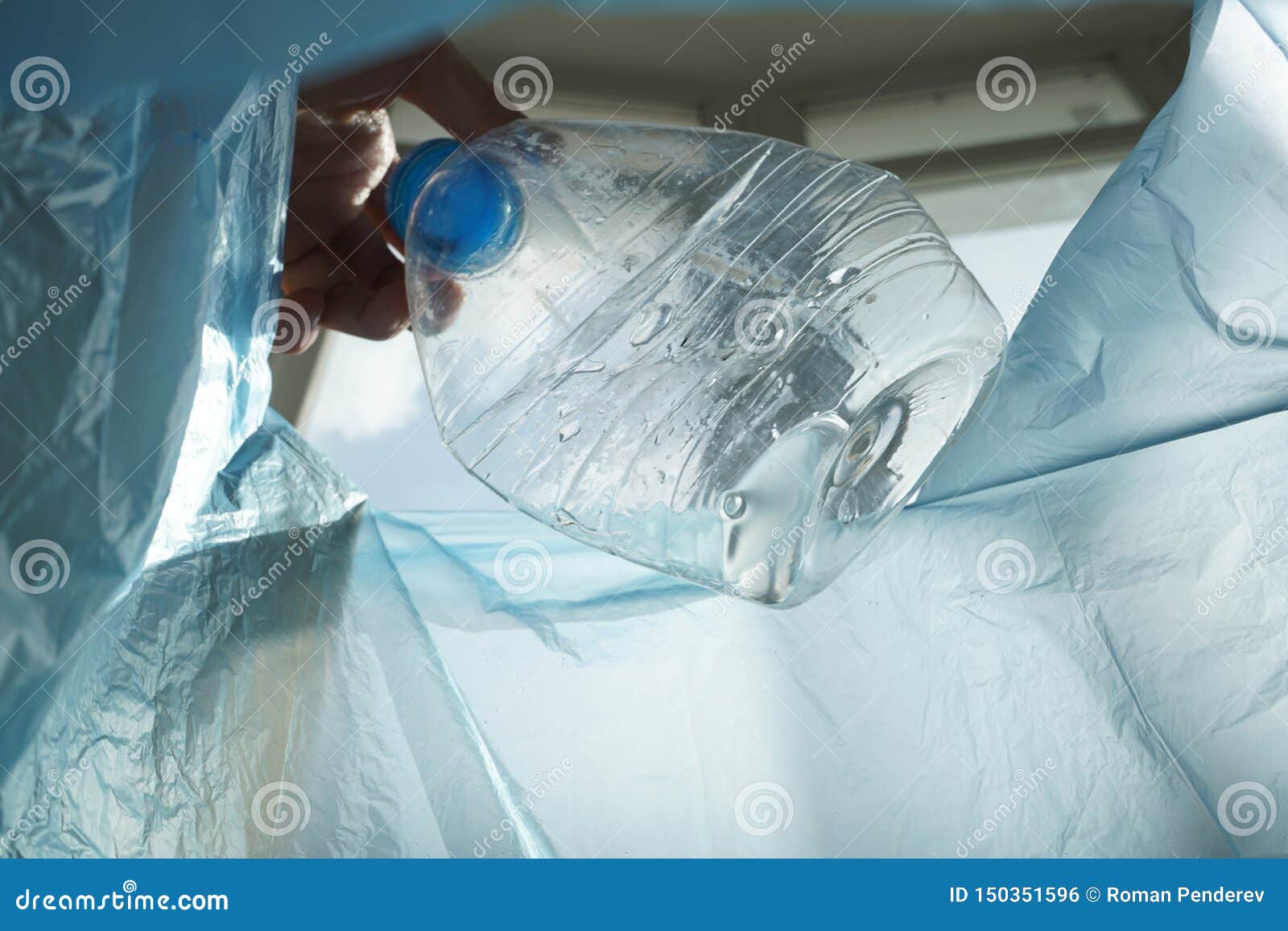 Throws Plastic Trash in the Bag Stock Photo Image of slow, blue