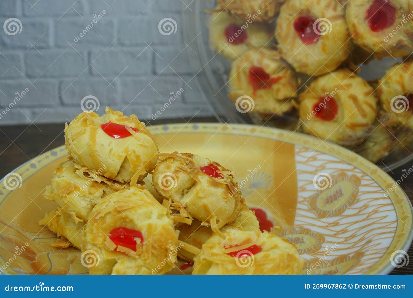 thumbprint cookies with cheese and strawberry or chocolate paste. reserved for eid al fitr and christmas.