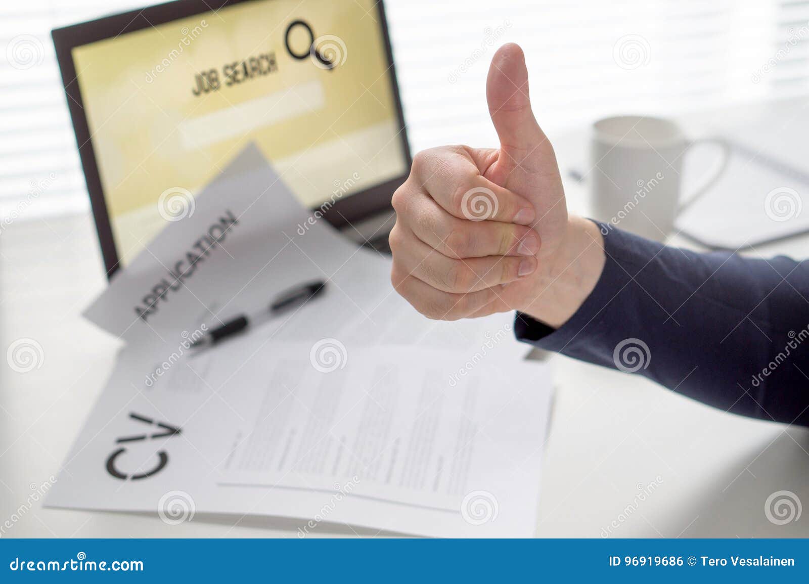 thumbs up for job search. applicant with positive attitude. happy jobseeker. cheerful man pleased with finding work.