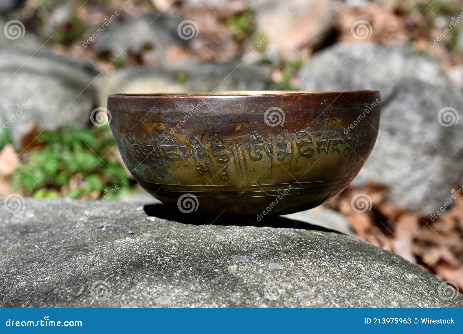A Singing Bowl on a Stone Outdoor Stock Image Image of hinduism
