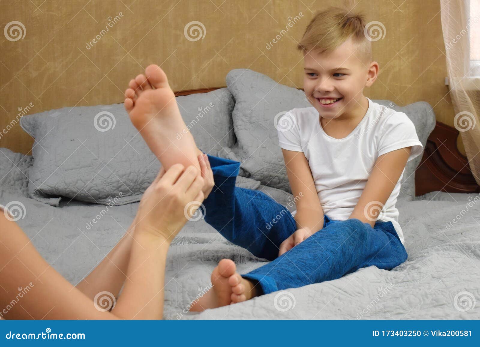 Tickle the Child. Happy Mother and Son on the Bed. Funny Motherhood. Stock  Photo - Image of joyful, enjoy: 173403250
