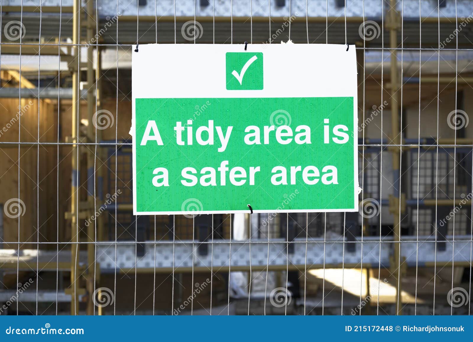 A Tidy Area is a Safe Area Construction. Site Safety Sign Stock Photo