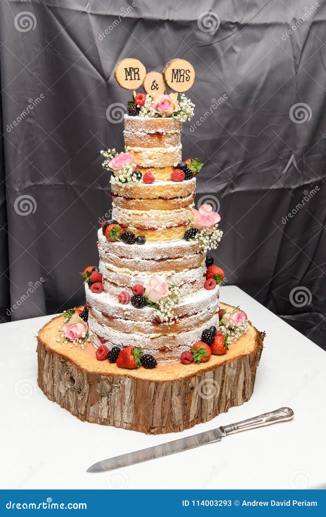 Naked Wedding Cake With Fresh Berries Fruit And Flowers Stock