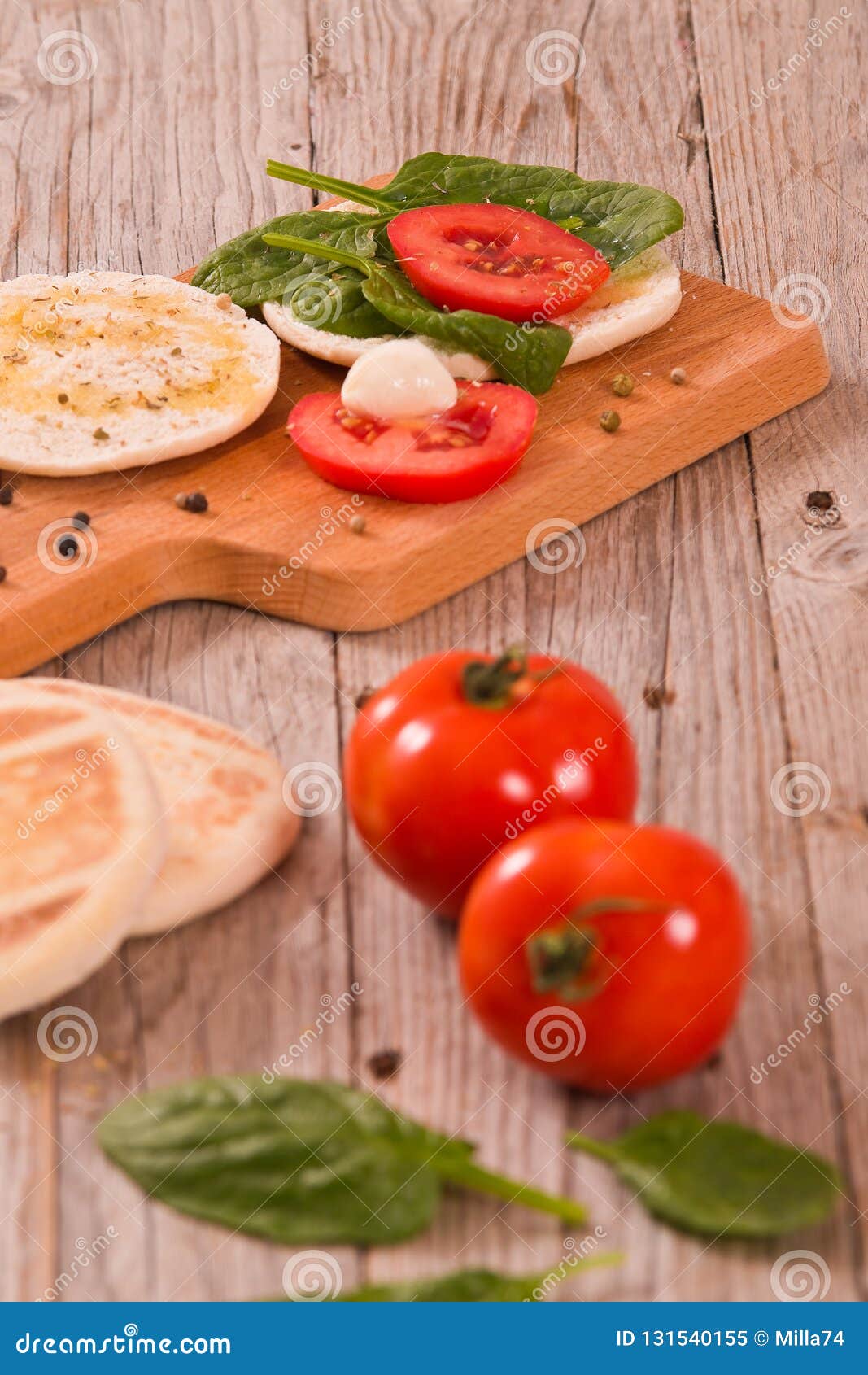 Tigella Bread with Spinach and Tomatoes. Stock Image - Image of filled ...