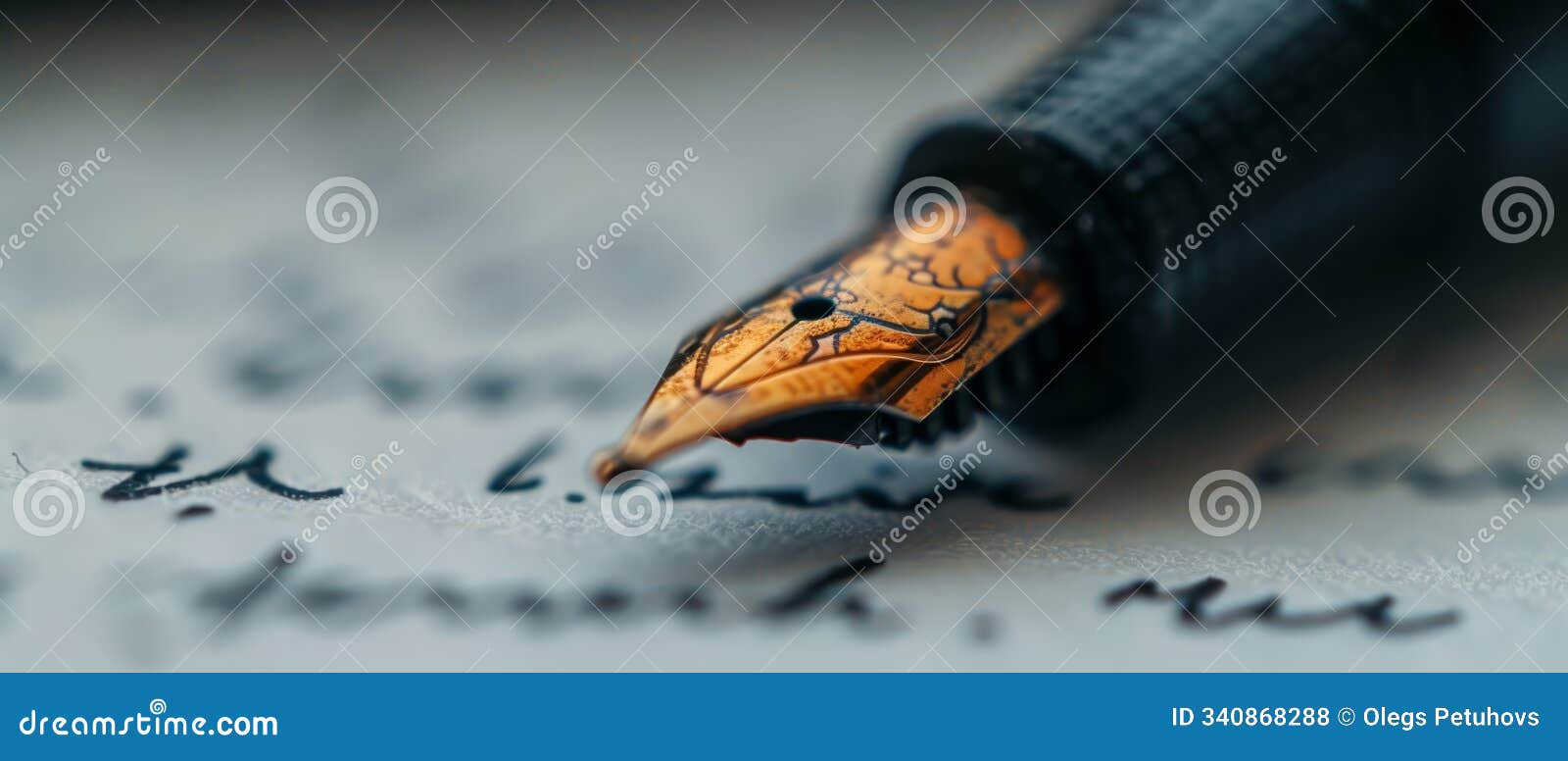 a tight shot of a fountain pen inscribing on a sheet of paper against a backdrop of elegant cursive script