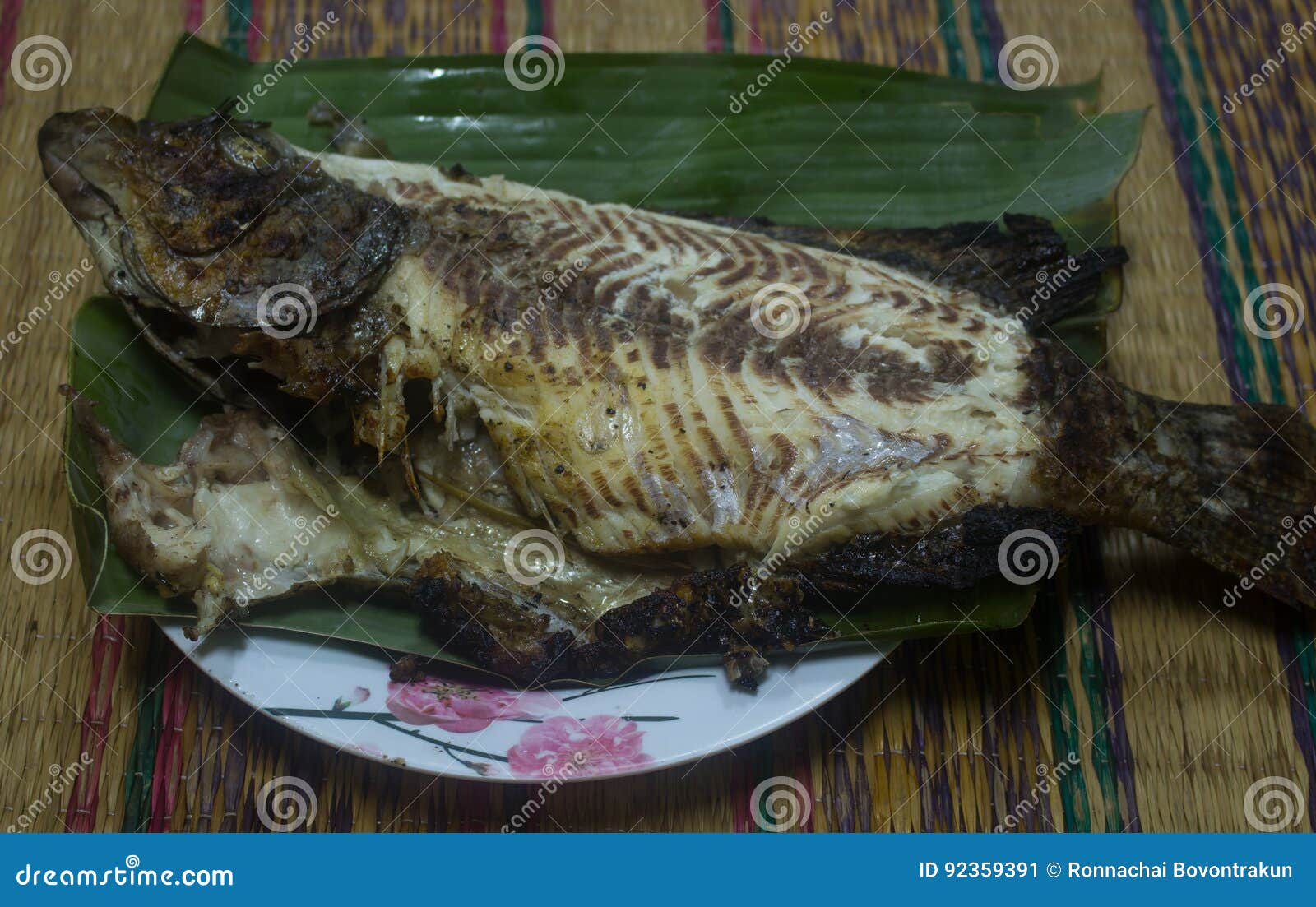 Tilapia Fish Grilled on the Banana Leaf Stock Image Image of thailand, lemon 92359391