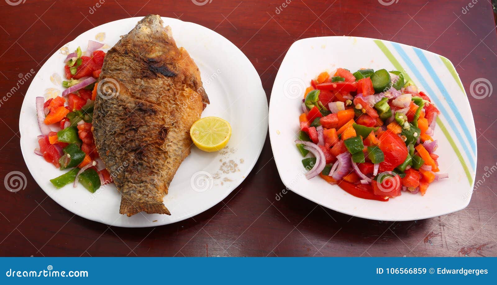 Tilapia fish with salad stock image. Image of delicious 106566859