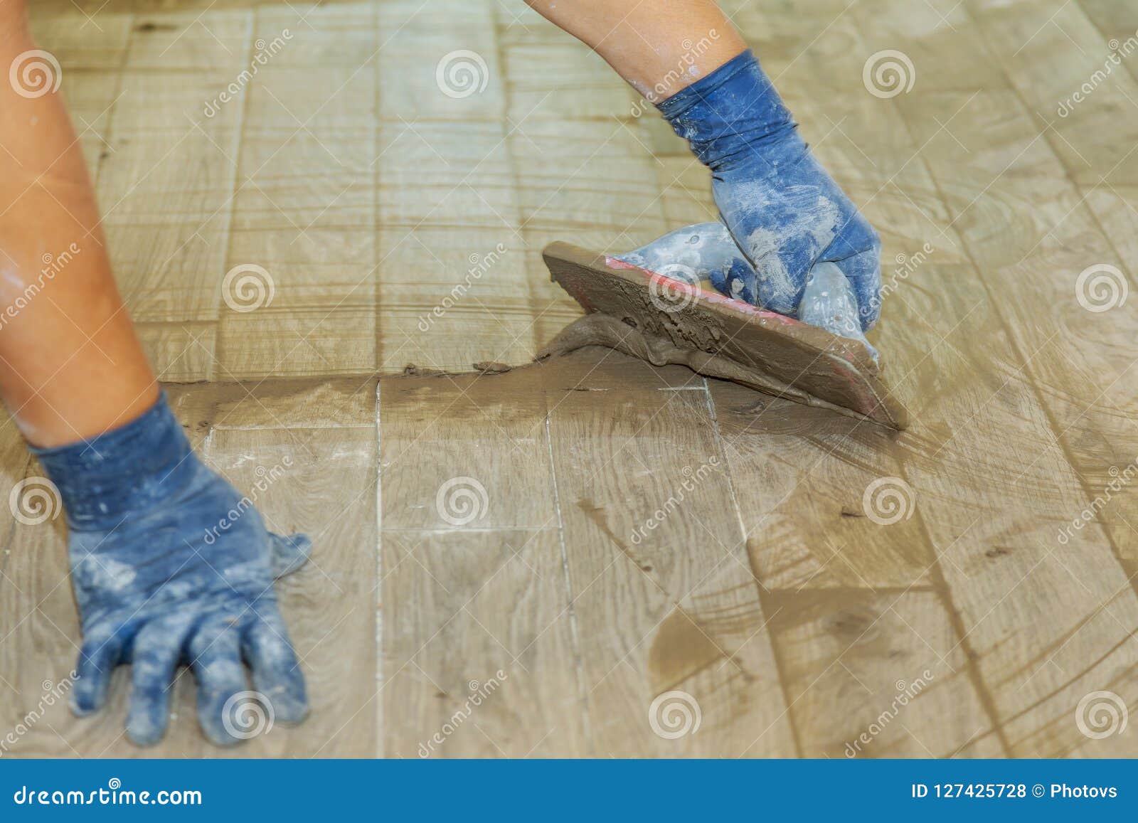 Gray Color Of New Grout Tile On For The Final Step For Flooring