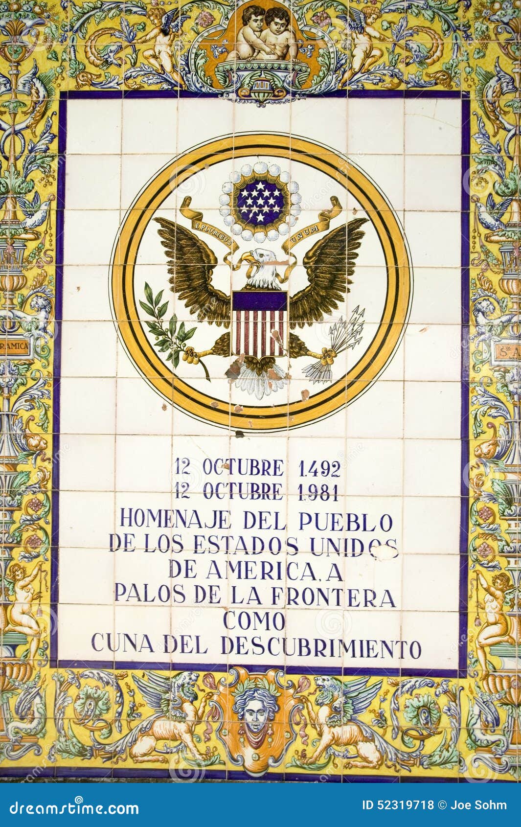 tile sign along the avenida de america reads, homage of the people of the united states of america to palos de la frontera, cradle