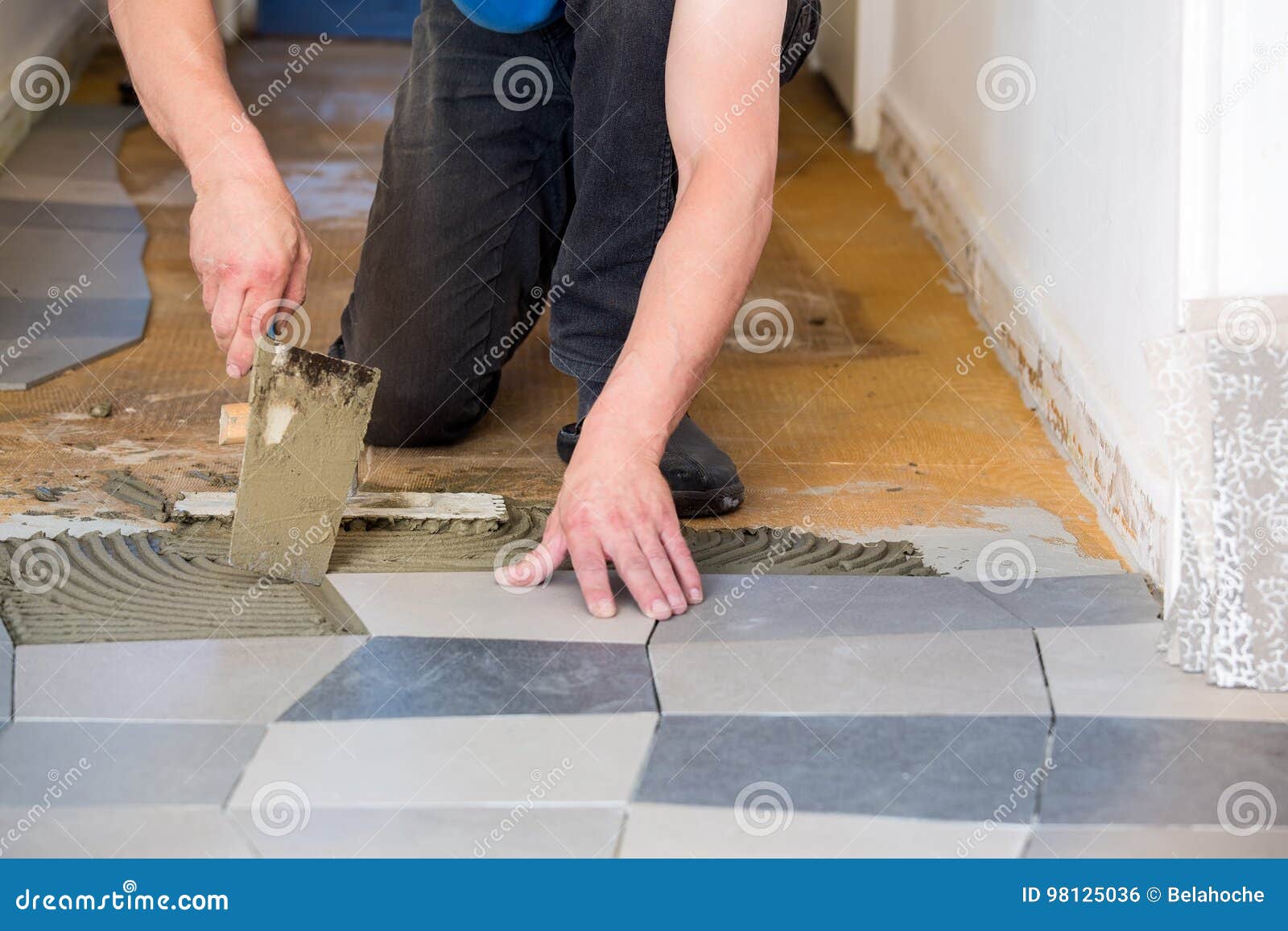 Tiler Laying Floor Tiles On Adhesive Stock Photo Image Of Tiles