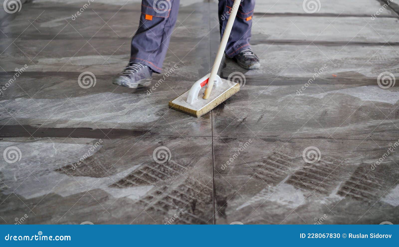 The Tiler Washes the Tiles after Work. a Worker Cleans the Tiles on the