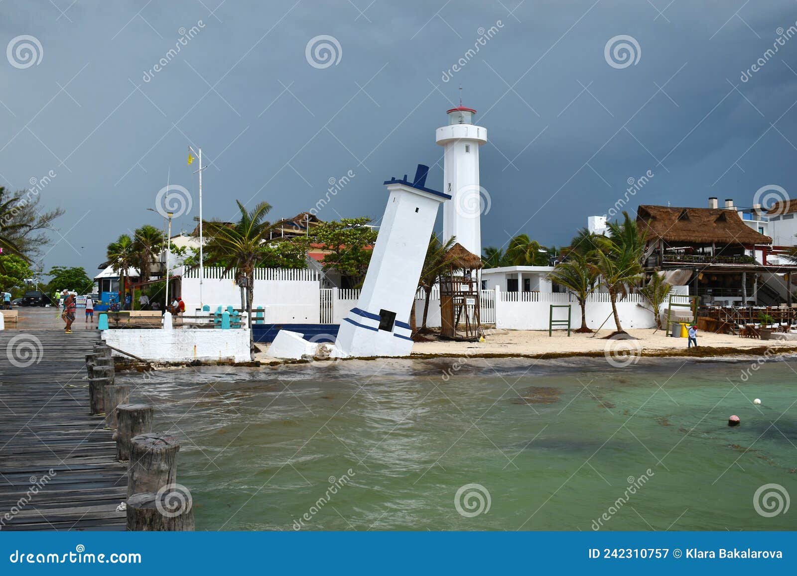 tilted faro inclinado lighthouse in puerto morelos at the malecon wooden pier on the yucatan peninsula in mexico