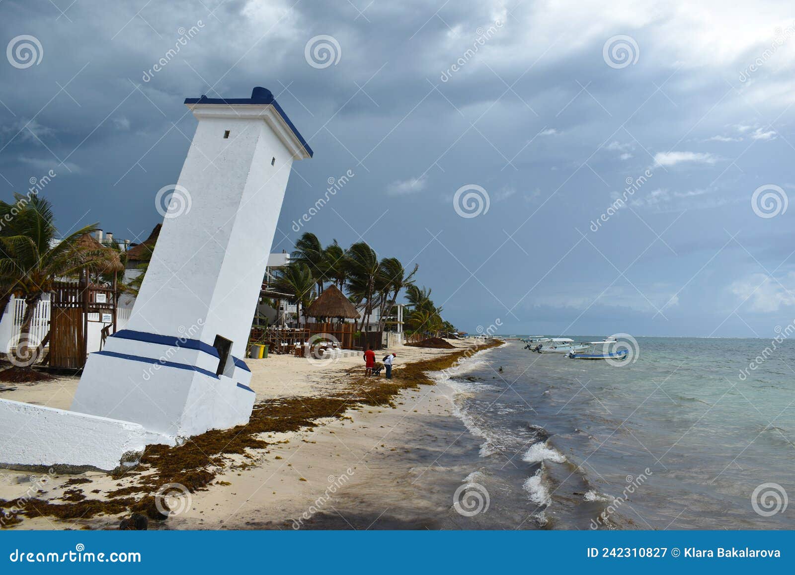 tilted faro inclinado lighthouse in puerto morelos at the malecon wooden pier on the yucatan peninsula in mexico