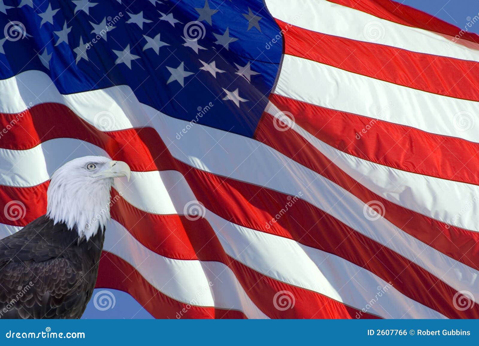 Tilted US Flag. Tilted stars and stripes flying in the wind on deep blue sky nice background for a patriotic display