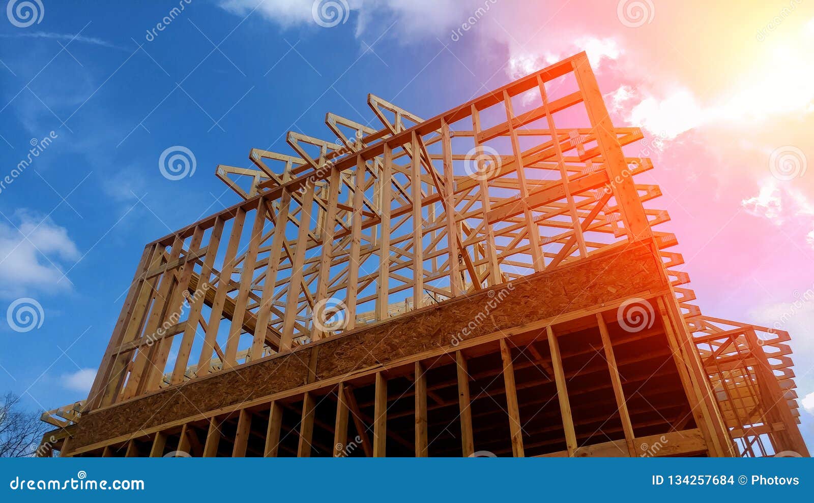 timber frame house, new build roof with wooden home construction framing