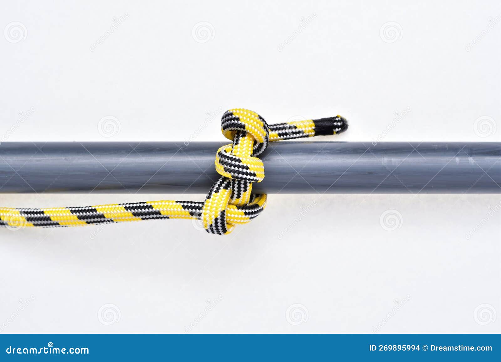 https://thumbs.dreamstime.com/z/timber-hitch-knot-yellow-black-nylon-rope-white-background-269895994.jpg