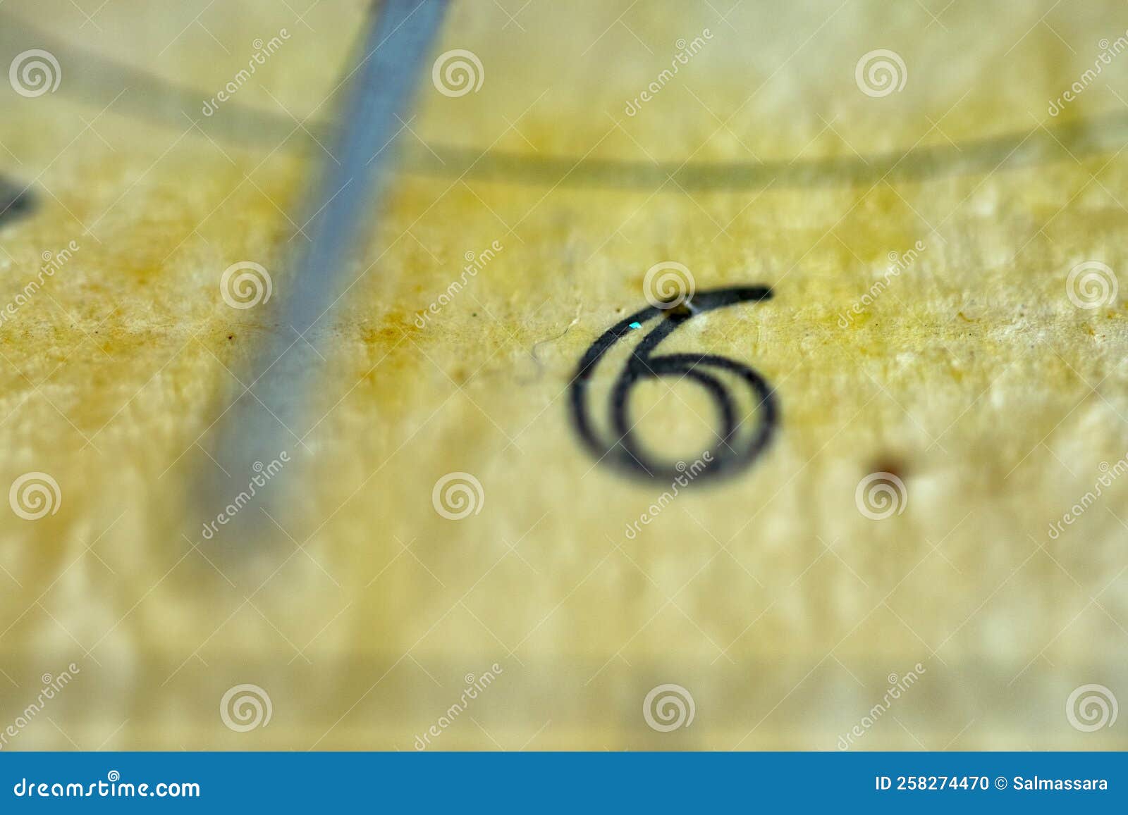 Time Concept with the Hour in a Clock Face of a Wall Clock Stock Photo