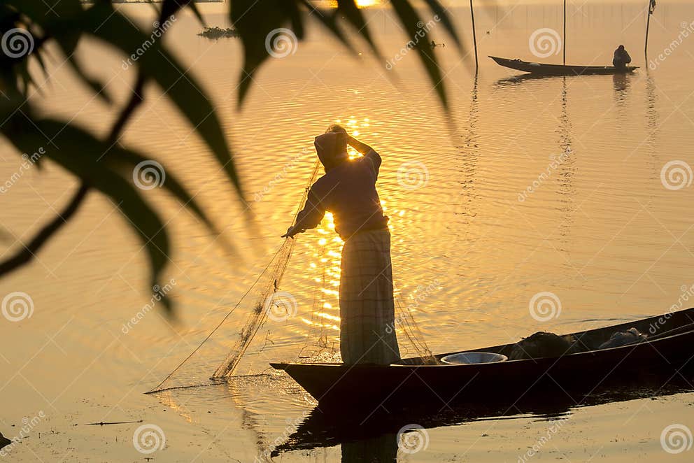 Sunrise Time Fisherman Fishin in Kaliganga River, Dhaka, Bangladesh